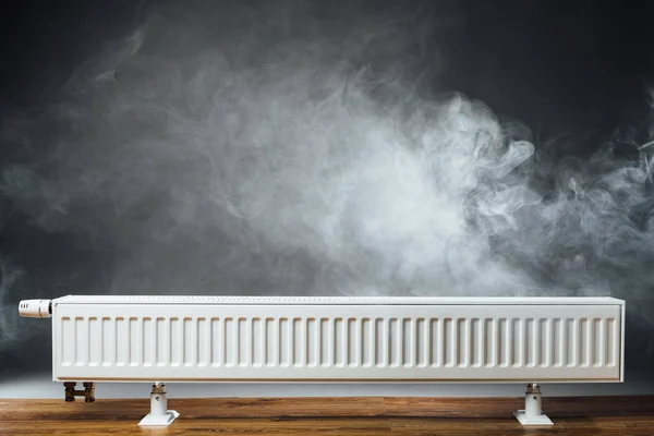 Heating radiator with warm steam — Stock Photo © nikkytok #162387522