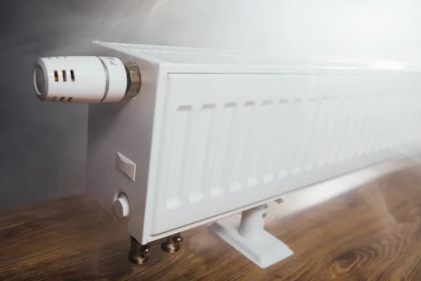 Heating radiator with warm steam — Stock Photo, Image