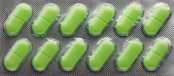 Blister pack with green pills — Stock Photo, Image