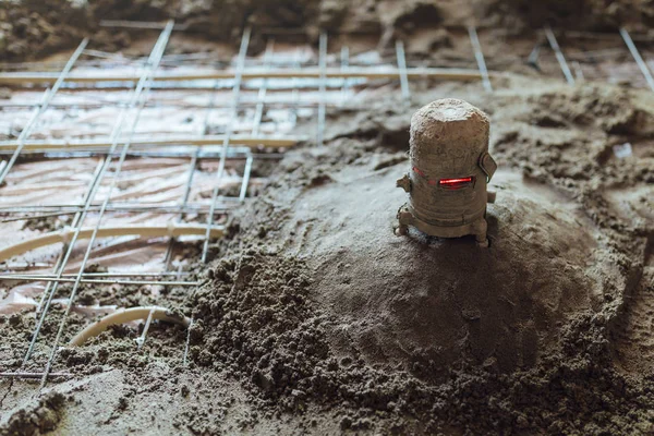 Herramienta de nivel láser para la instalación de suelo de hormigón — Foto de Stock