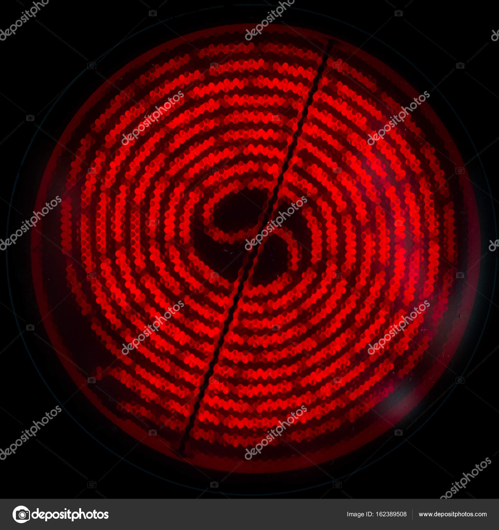 Electric stove red hot coil, top view circle Stock Photo by ©nikkytok 162389508