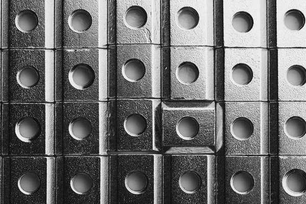 Porcas de parafuso deslizante em uma linha, fundo industrial abstrato — Fotografia de Stock