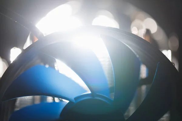 Blue cpu cooler inside PC case, shiny light background — Stock Photo, Image