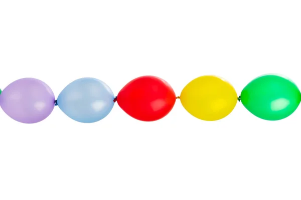 Святкові різнокольорові лінійні кульки, ізольовані на білому — стокове фото
