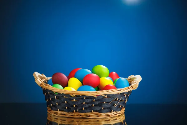 Easter Color Eggs Festive Gift Basket Blue Background Copy Space — Stock Photo, Image