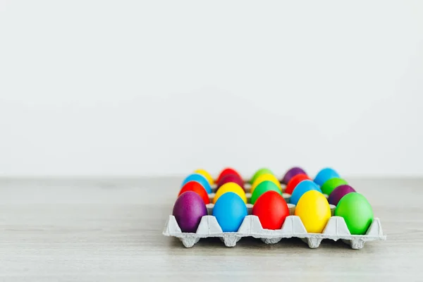 Easter Festive Multicolor Eggs Carton Light Gray Wooden Background Copy — Stock Photo, Image