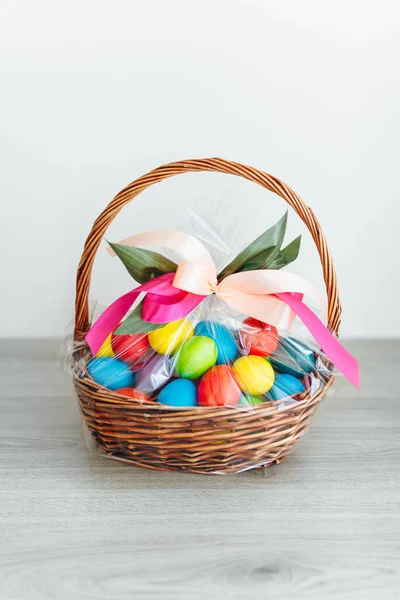 Easter Color Eggs Festive Gift Basket Light Gray Wooden Background — Stock Photo, Image