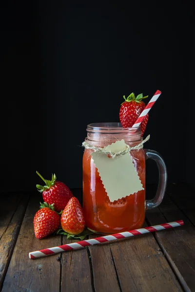 Strawberry smoothie in a glass jar — Stock Photo, Image