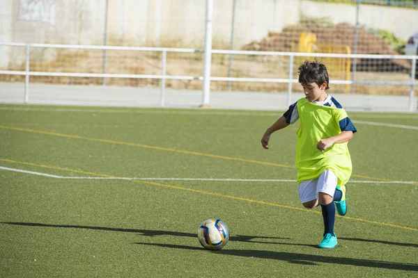 Young football player in a training — Stock Photo, Image