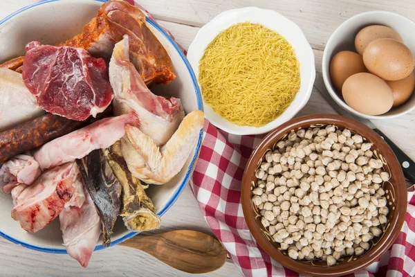 Cocido a Spanish stew with assortment of meat and chikpeas — Stock Image Cocido a Spanish stew with assortment of meat and chikpeas Stock Image