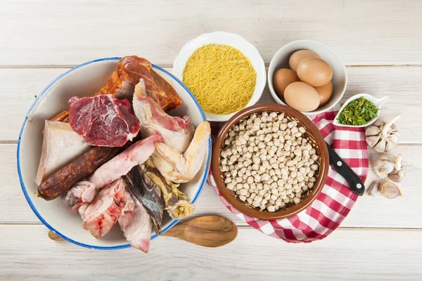 Cocido a Spanish stew with assortment of meat and chikpeas — Stock Image Cocido a Spanish stew with assortment of meat and chikpeas Royalty Free Stock Images