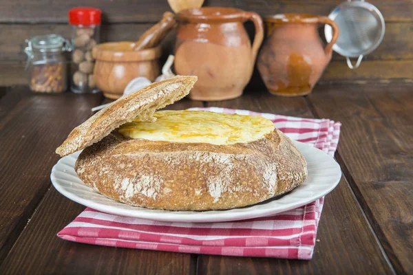 Stuffed crusty loaf of bread — Stock Photo, Image