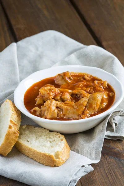 Crubeens with tomato sauce and bread — Stock Photo, Image