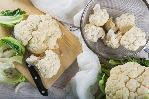 Raw cauliflower on the table of the kitchen — Stock Photo, Image