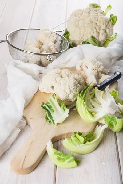 Raw cauliflower on the table of the kitchen — Stock Photo, Image