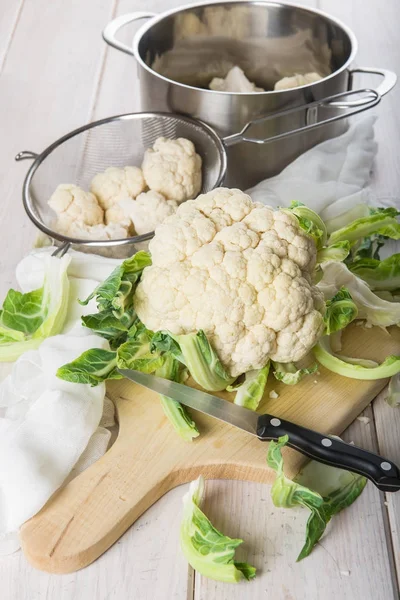 Raw cauliflower on the table of the kitchen — Stock Photo, Image