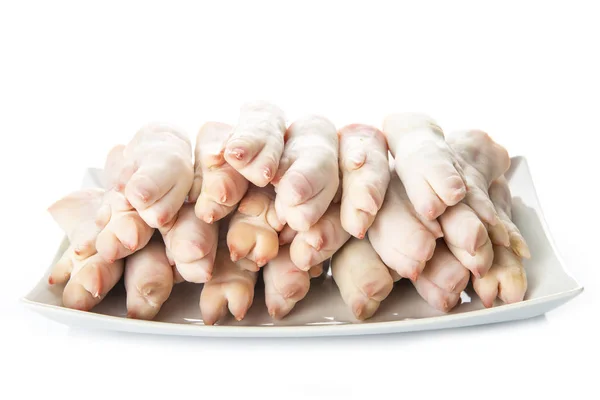 Raw crubeens or pig trotters — Stock Photo, Image