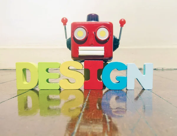 Rode retro robot hoofd op het woord Design o — Stockfoto