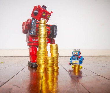 Vintage robot oyuncakları ve para brüt eşitsizlik kavramı. 