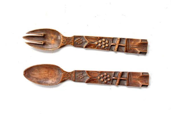 Vista dall'alto di cucchiaio e forchetta in legno isolati su bianco — Foto Stock