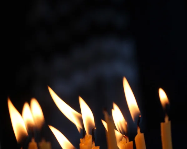 Vlam van een kaarsen close-up — Stockfoto
