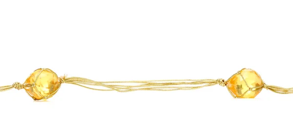 Collar con gemas de plástico barato con cuerda de color dorado —  Fotos de Stock