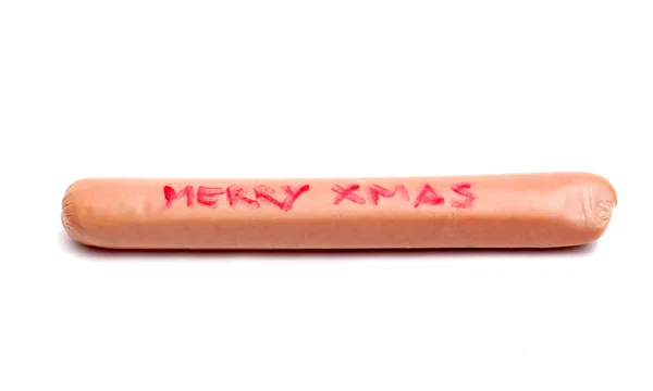 Picture of a handwritten text merry christmas on a sausage on white background — Stock Photo, Image