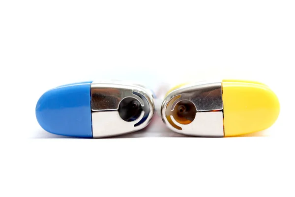 Blue and yellow lighters isolated on the white background — Stock Photo, Image