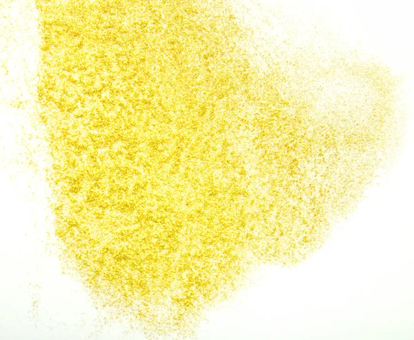 Polvere glitter oro su sfondo bianco — Foto Stock