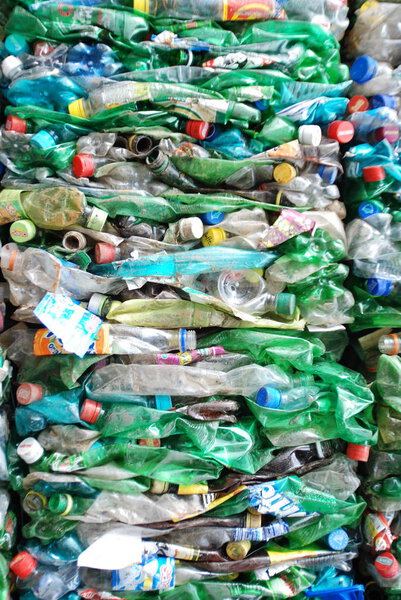 SKOPJE, MACEDONIA-DEC 12, 2008: Close-up view plastic bottles of various drinks in the yard of a company specializing in ecological treatments. Large heap of plastic bottles .