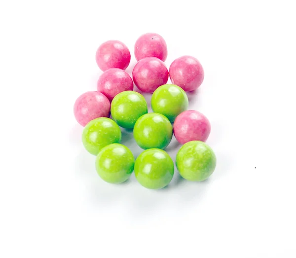 A pile of colorful gumballs on a white background. — Stock Photo, Image