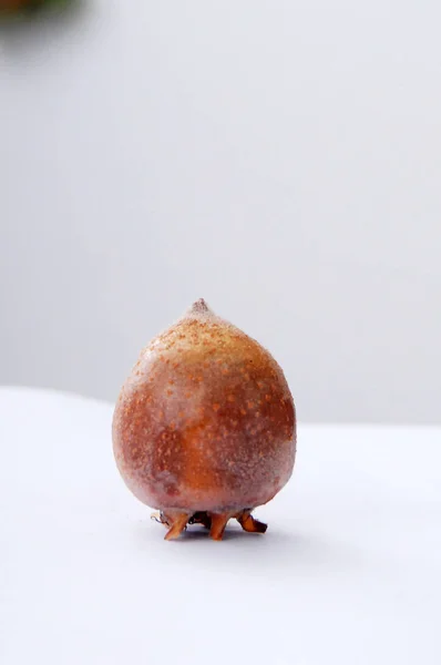 Medlar fruit on white — Stock Photo, Image