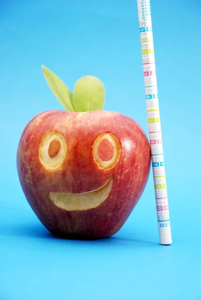 Red apple, smiling face, food concept, pencil, — Stock Photo, Image