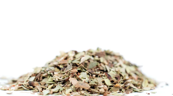 Pile of dried oregano leaves isolated on white background — Stock Photo, Image