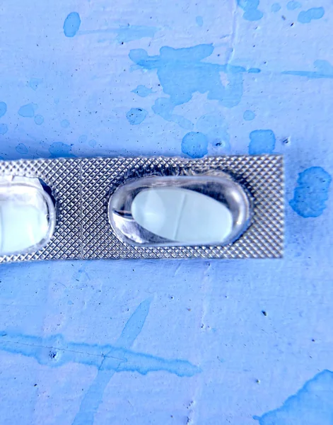 Μπλε χάπια σε μια συσκευασία κυψέλης, — Φωτογραφία Αρχείου
