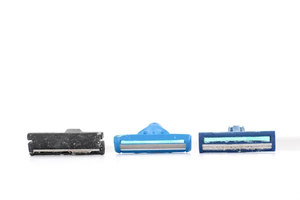 Used shaving razor on a white background — Stock Photo, Image