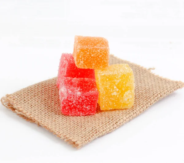 Colored Sweet.Jellies on small jute bag — Stok Foto