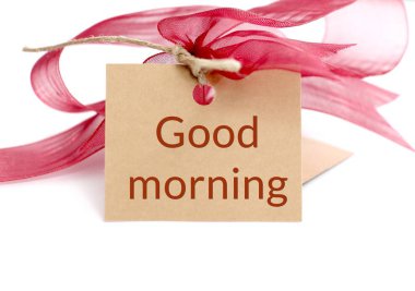 kırmızı kurdele ve kahverengi bir kağıt üzerine metin ile