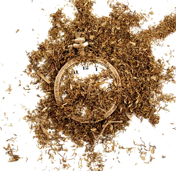 Trockener Tabak und Jahrgangsuhr, — Stockfoto