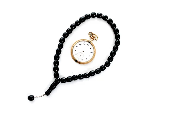 Perline di preghiera e orologio da tasca vintage, tempo per pregare — Foto Stock