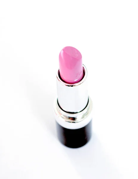 Rosa Lippenstift auf weißem Hintergrund — Stockfoto