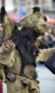 PRILEP, MACEDONIA. FEBRUARY 18 , 2018- A 'Mechkari' performer participates in the carnival Prochka 2018 in the Macedonian town of Prilep. '