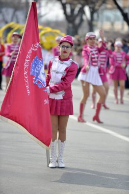 PRILEP, MACEDONIA. FEBRUARY 18 , 2018- Young majorettes from Serbia performs various dancing skills on street during the annual international carnival Prochka 2018, in city of Prilep,Macedonia clipart