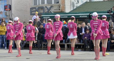 PRILEP, MACEDONIA. FEBRUARY 18 , 2018- Young majorettes from Serbia performs various dancing skills on street during the annual international carnival Prochka 2018, in city of Prilep,Macedonia clipart