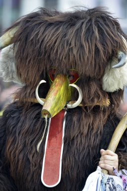 PRILEP, MACEDONIA. FEBRUARY 18 , 2018- Performers wearing animal fur and mask participates in the International carnival Prochka 2018 in the Macedonian town of Prilep. '