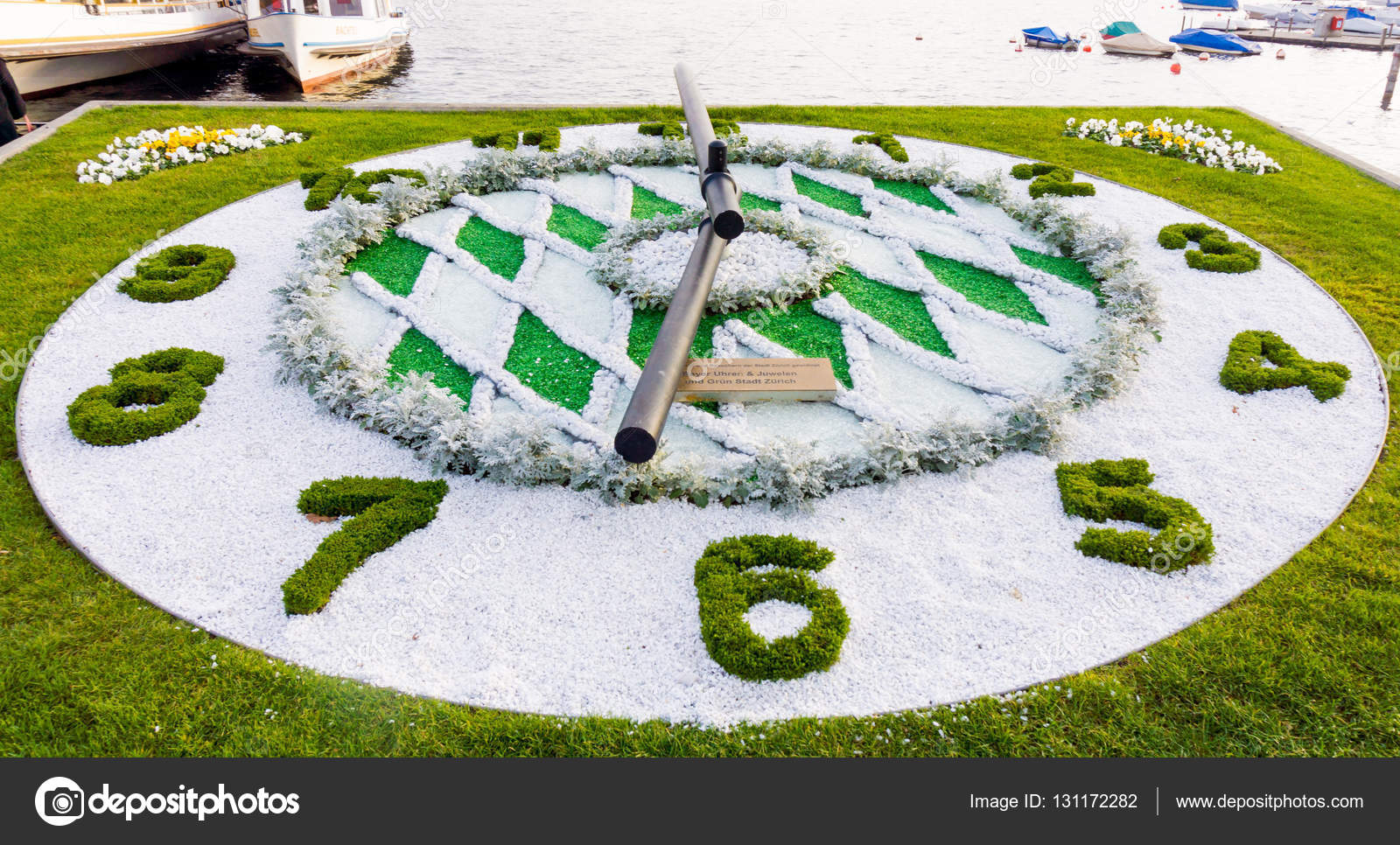 SWITZERLAND, ZURICH 2016 3 NOVEMBER. Flower clock on the lake o Stock
