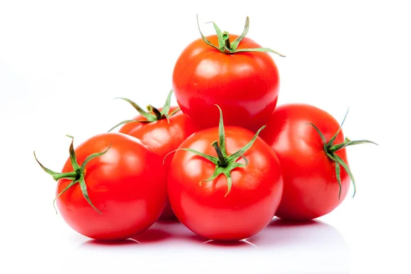 Legumbres de tomate aisladas sobre fondo blanco Imagen De Stock