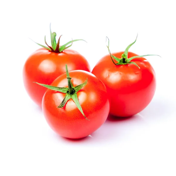 Legumes de tomate isolados sobre fundo branco — Fotografia de Stock