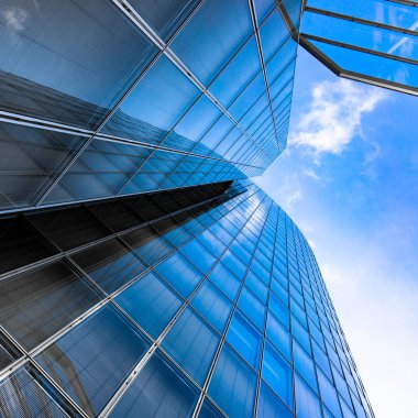 Mavi gökdelenin cephe. ofis binaları. Modern cam silhouett