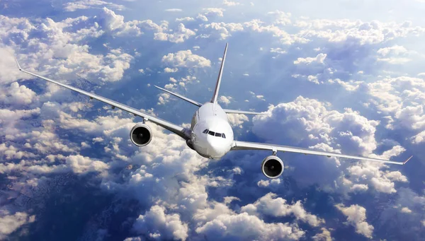 Airliner flying above clouds. Passenger airplane — Stock Photo, Image